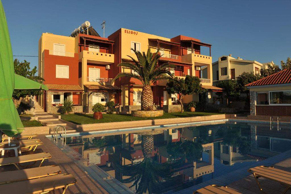 The buildings of Eliros Studios beside the swimming pool